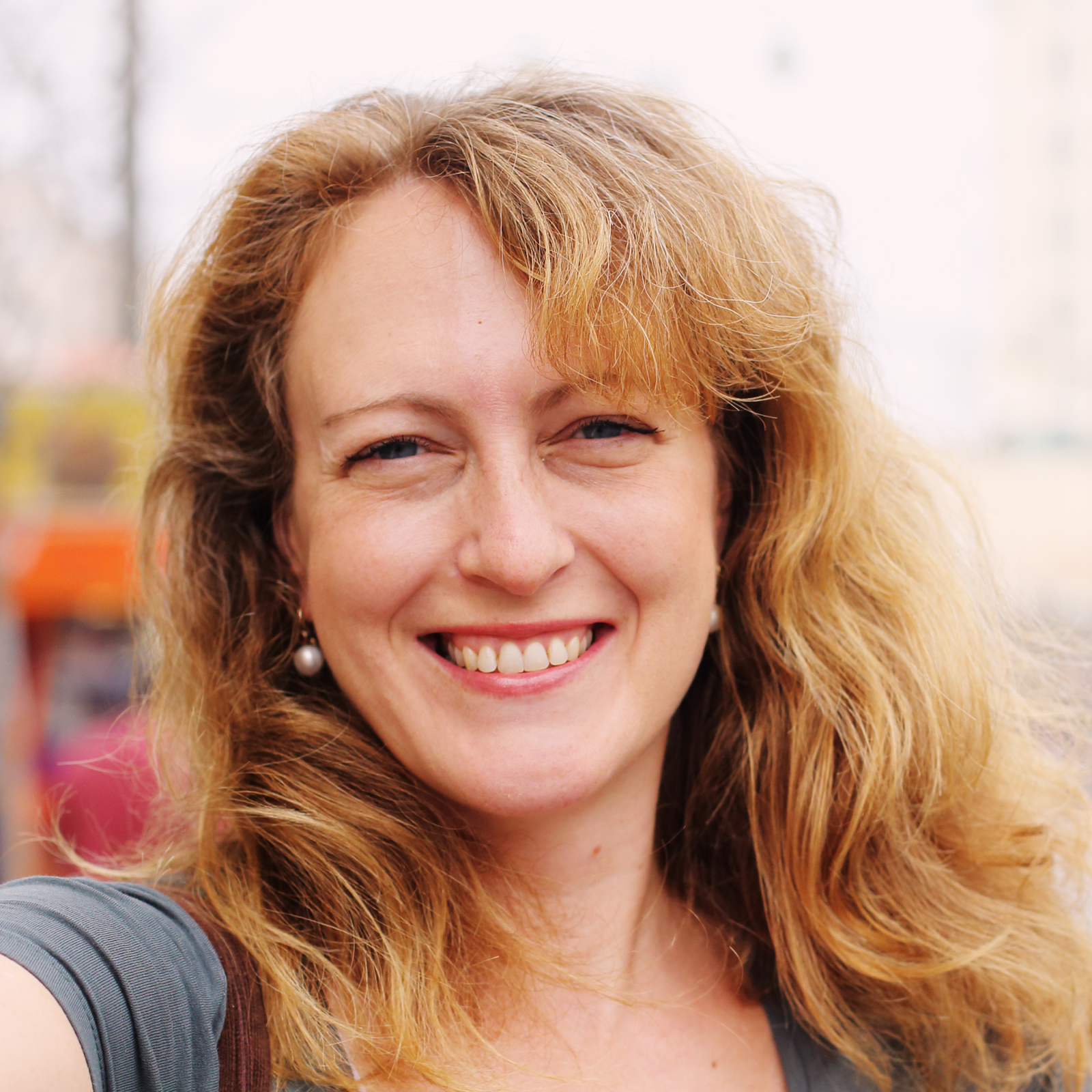 picture of shirley davis. old woman smiling and wearing with a white shirt