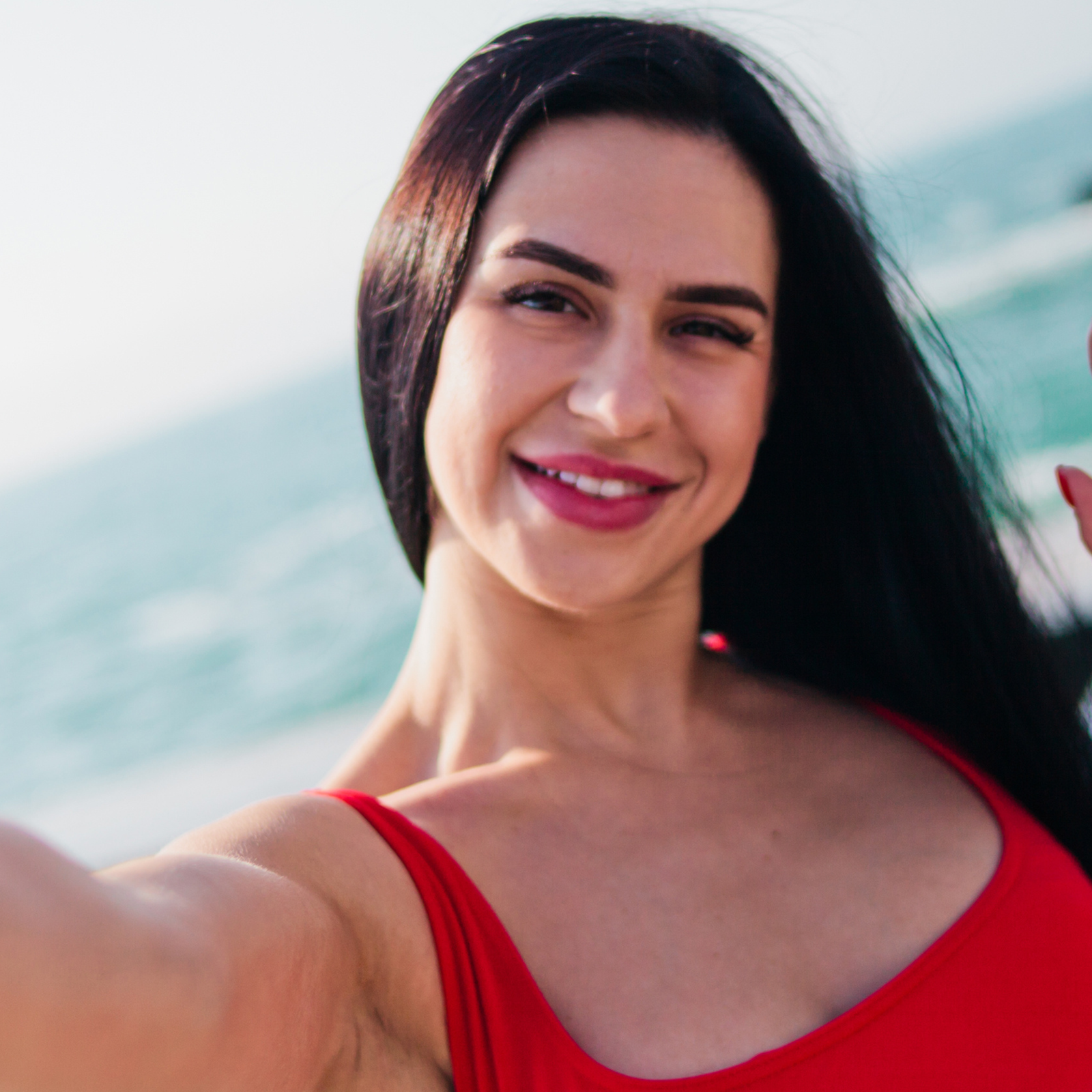 picture of lauren Brown. woman in the beach, smiling